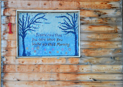 photo from Pinehouse of artwork saying "Be more than you were when you woke up this morning"
