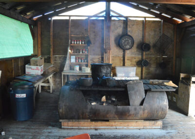 photo from Pinehouse outdoor kitchen of wood stove