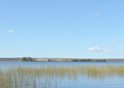 photo from Pinehouse of canoes by lake
